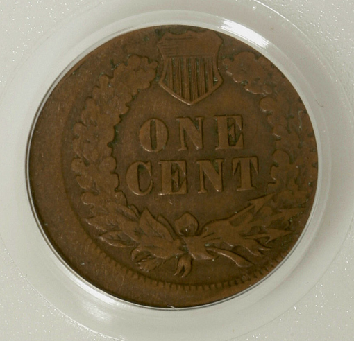 1883 Indian Head Penny off-center strike error showing design shifted to one side with blank planchet area visible